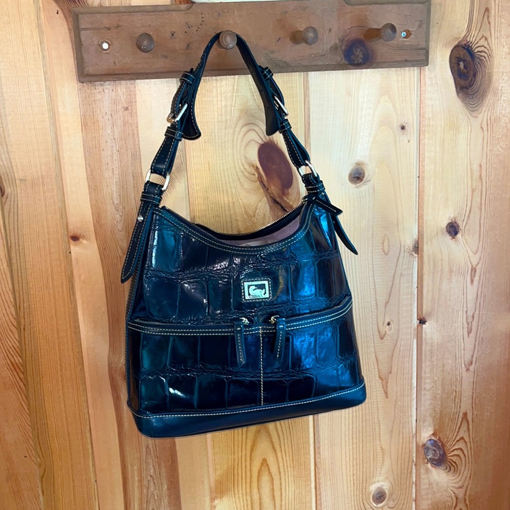 Dooney and Bourke crocodile embossed leather purse. Hobo bucket style bag.